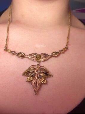 Land storms Black Hills 10k gold necklace with olive and leaves design, tri colo